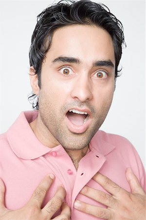 simsearch:630-01491544,k - Portrait of a young man looking surprised Stock Photo - Premium Royalty-Free, Code: 630-01875394