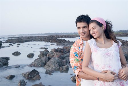 simsearch:630-01296756,k - Young man embracing a young woman from behind on the coast Foto de stock - Sin royalties Premium, Código: 630-01875493