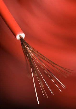 electrical energy hazard - Close-up of a red power cable Stock Photo - Premium Royalty-Free, Code: 630-01875582