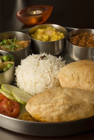 Close-up of assorted Indian food Foto de stock - Sin royalties Premium, Código: 630-01875688