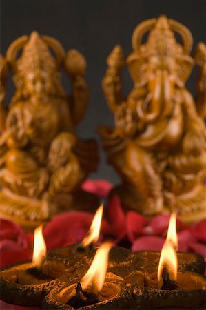 elephant god - Close-up of oil lamps Stock Photo - Premium Royalty-Free, Code: 630-01875739
