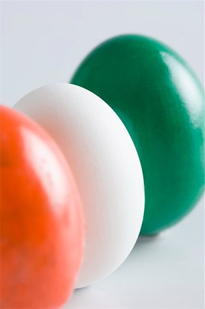 Close-up of three eggs painted in colors of Indian flag Stock Photo - Premium Royalty-Free, Code: 630-01875755