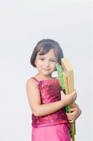 Girl holding crackers and smiling Foto de stock - Sin royalties Premium, Código: 630-01877194