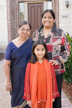 preteen girls looking older - Portrait of a girl standing with her mother and grandmother Stock Photo - Premium Royalty-Free, Code: 630-01877787