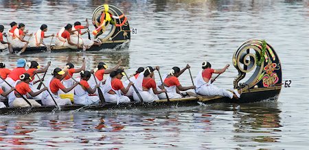 people holding snakes - Group of people participating in a snake boat racing, Kerala, India Stock Photo - Premium Royalty-Free, Code: 630-01872109