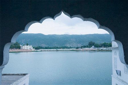 pushkar - Lake viewed through an arch, Pushkar Lake, Pushkar, Rajasthan, India Stock Photo - Premium Royalty-Free, Code: 630-01872120