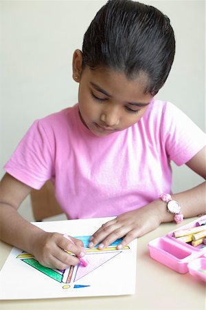 Girl making a drawing with crayon Foto de stock - Sin royalties Premium, Código: 630-01873433