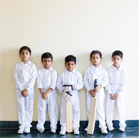 Portrait of five boys standing in a row Stock Photo - Premium Royalty-Free, Code: 630-01873654