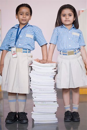 simsearch:630-01873514,k - Portrait of two schoolgirls standing with a stack of books Foto de stock - Sin royalties Premium, Código: 630-01873803