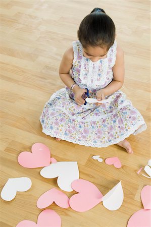 simsearch:630-02221120,k - High angle view of a girl making greeting cards Stock Photo - Premium Royalty-Free, Code: 630-02219262