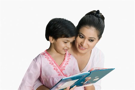 simsearch:630-02219943,k - Young woman teaching her daughter Stock Photo - Premium Royalty-Free, Code: 630-02219470