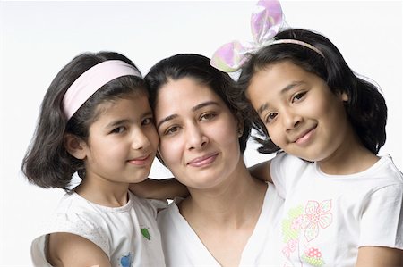 simsearch:630-02219943,k - Portrait of two girls hugging their mother Stock Photo - Premium Royalty-Free, Code: 630-02219737