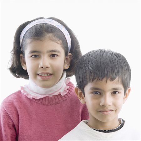 simsearch:630-02221120,k - Portrait of a girl smiling with her brother Stock Photo - Premium Royalty-Free, Code: 630-02219958