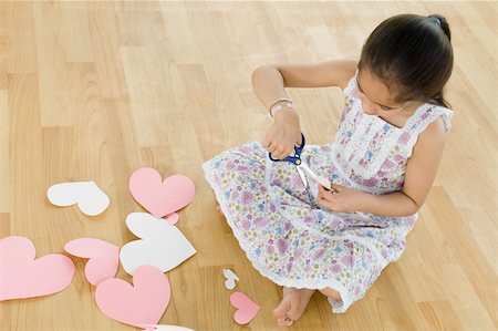 simsearch:630-02221120,k - High angle view of a girl making greeting cards Stock Photo - Premium Royalty-Free, Code: 630-02220239