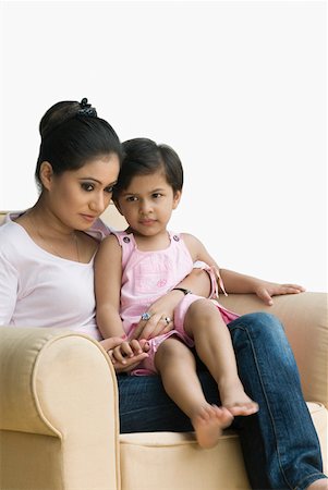 simsearch:630-02219943,k - Girl sitting with her mother in an armchair Stock Photo - Premium Royalty-Free, Code: 630-02220832