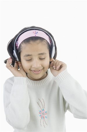 simsearch:630-02221120,k - Girl listening to music Stock Photo - Premium Royalty-Free, Code: 630-02220916