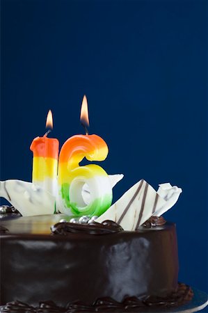 simsearch:630-02219911,k - Close-up of lit candles on a birthday cake Stock Photo - Premium Royalty-Free, Code: 630-02221075