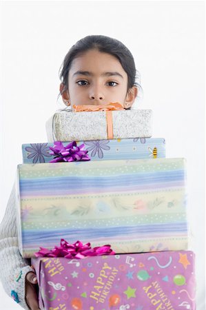 simsearch:630-02221120,k - Portrait of a girl holding presents Stock Photo - Premium Royalty-Free, Code: 630-02221128