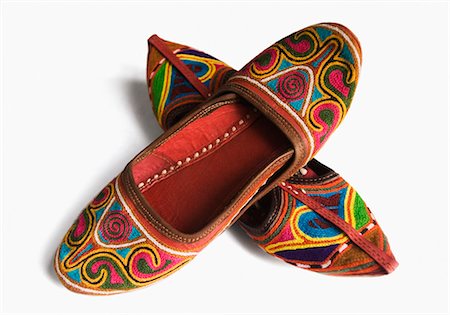 simsearch:857-03192847,k - Close-up of two pairs of colorful traditional footwear Foto de stock - Sin royalties Premium, Código: 630-03479249