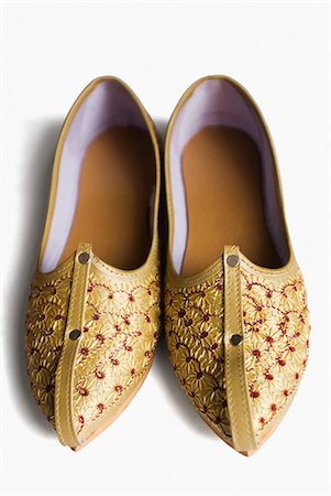 simsearch:857-03192847,k - Close-up of a pair of footwear Foto de stock - Sin royalties Premium, Código: 630-03479251