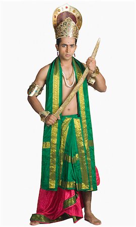 Portrait of a young man in a character of Hindu epic Stock Photo - Premium Royalty-Free, Code: 630-03479564