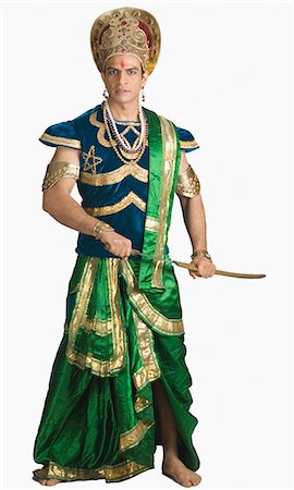 simsearch:630-03481389,k - Male character of a Hindu epic holding a sword Stock Photo - Premium Royalty-Free, Code: 630-03479573