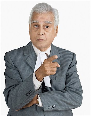 Close-up of a male lawyer pointing Stock Photo - Premium Royalty-Free, Code: 630-03479634