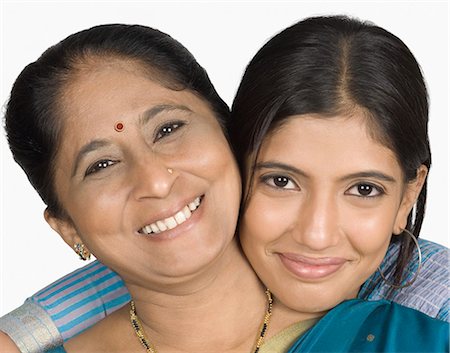 simsearch:630-03479683,k - Mature woman smiling with her daughter Stock Photo - Premium Royalty-Free, Code: 630-03479761