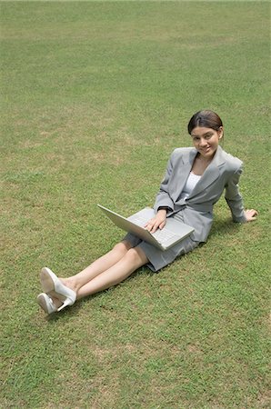 simsearch:630-03479530,k - Businesswoman working on a laptop Stock Photo - Premium Royalty-Free, Code: 630-03479829