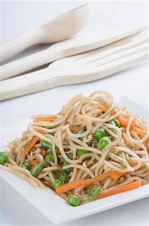 fork with noodles - Close-up of noodles in a plate Stock Photo - Premium Royalty-Free, Code: 630-03479977