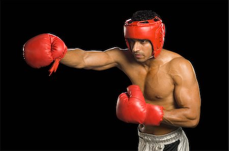 simsearch:400-03984387,k - Boxer practicing boxing Stock Photo - Premium Royalty-Free, Code: 630-03480366