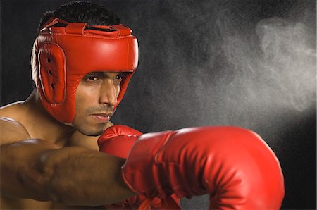 simsearch:400-03984387,k - Boxer practicing boxing Stock Photo - Premium Royalty-Free, Code: 630-03480367