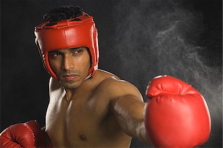 simsearch:400-03984387,k - Boxer practicing boxing Stock Photo - Premium Royalty-Free, Code: 630-03480368
