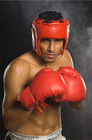 simsearch:400-03984387,k - Boxer practicing boxing Stock Photo - Premium Royalty-Free, Code: 630-03480369