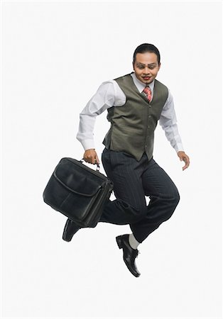 silense (artist) - Businessman carrying a bag Stock Photo - Premium Royalty-Free, Code: 630-03480614