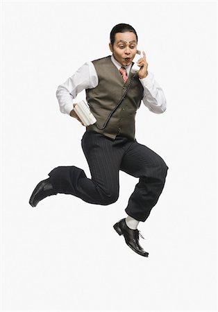 Mime talking on the phone Stock Photo - Premium Royalty-Free, Code: 630-03480619