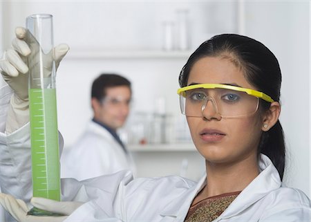 simsearch:625-02929180,k - Scientist holding a burette Stock Photo - Premium Royalty-Free, Code: 630-03480790
