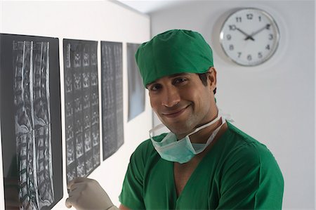 simsearch:625-02929180,k - Portrait of a male surgeon smiling Stock Photo - Premium Royalty-Free, Code: 630-03480846