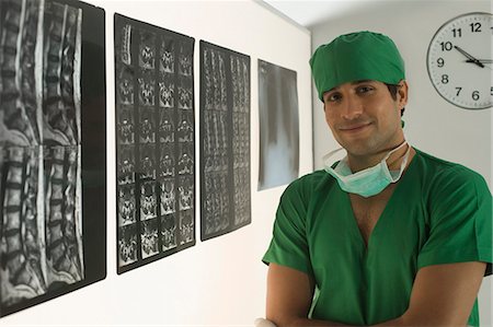 simsearch:625-02929180,k - Portrait of a male surgeon smiling Stock Photo - Premium Royalty-Free, Code: 630-03480856