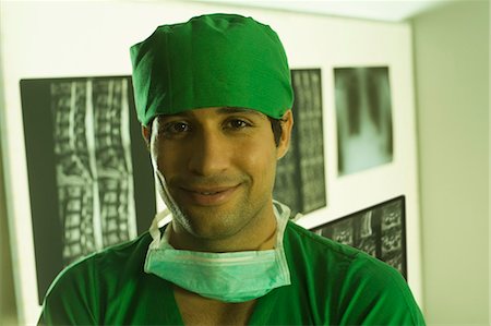 simsearch:625-02929180,k - Portrait of a male surgeon smiling Stock Photo - Premium Royalty-Free, Code: 630-03480859