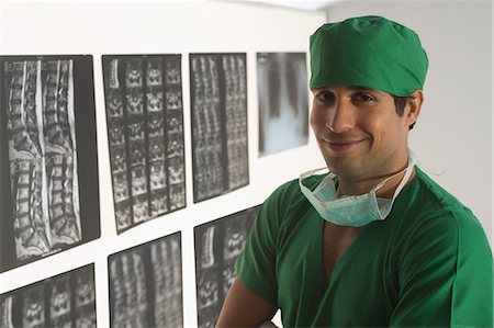 simsearch:625-02929180,k - Portrait of a male surgeon smiling Stock Photo - Premium Royalty-Free, Code: 630-03480860
