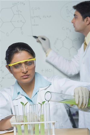 simsearch:649-07585094,k - Scientists working in a laboratory Stock Photo - Premium Royalty-Free, Code: 630-03480960