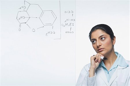 Scientist thinking in a lab Stock Photo - Premium Royalty-Free, Code: 630-03480989