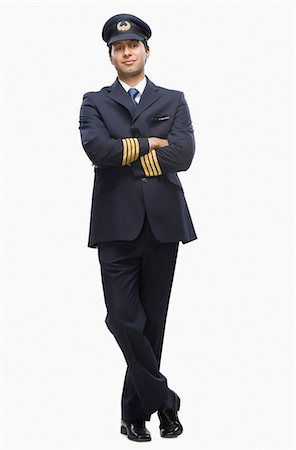 Portrait of a pilot with his arms crossed Stock Photo - Premium Royalty-Free, Code: 630-03481130