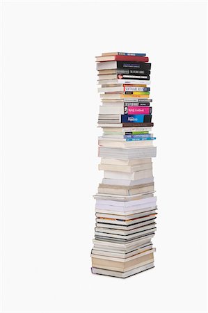 stack of books - Stack of books against white background Stock Photo - Premium Royalty-Free, Code: 630-03481177