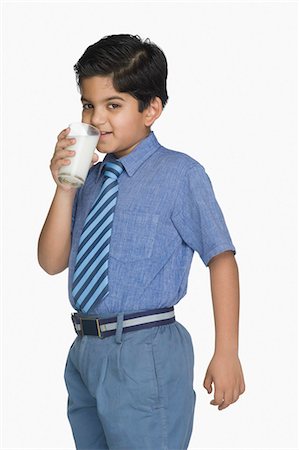 simsearch:630-07071771,k - Portrait of a schoolboy drinking milk from a glass Stock Photo - Premium Royalty-Free, Code: 630-03481291