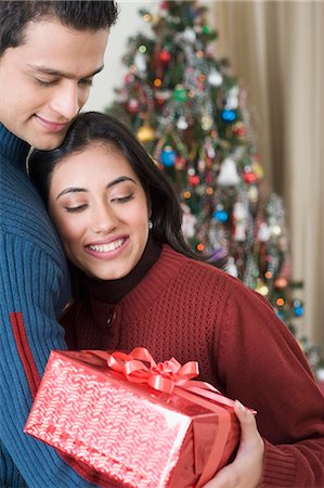 Couple celebrating Christmas Stock Photo - Premium Royalty-Free, Code: 630-03482735