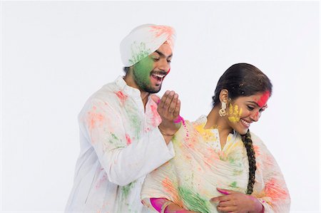 Couple celebrating Holi Stock Photo - Premium Royalty-Free, Code: 630-03482886