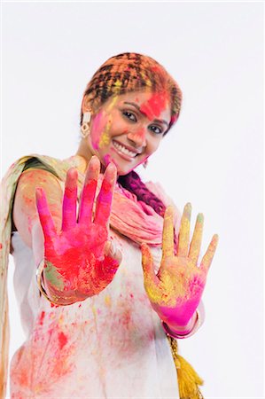 simsearch:6107-06117573,k - Woman showing her colored hands on Holi Stock Photo - Premium Royalty-Free, Code: 630-03482906