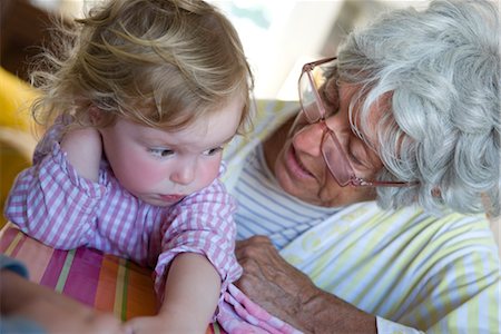 Grandmother comforting toddler granddaughter Stock Photo - Premium Royalty-Free, Code: 632-05401145
